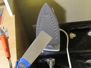 Bridge re-glue on a 1970's Guild 12-String acoustic guitar by South Austin Guitar Repair.