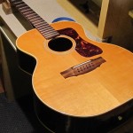 Bridge re-glue on a 1970's Guild 12-String acoustic guitar by South Austin Guitar Repair