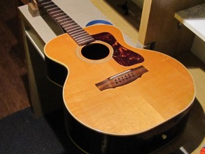 Bridge re-glue on a 1970's Guild 12-String acoustic guitar by South Austin Guitar Repair