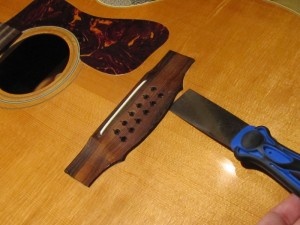 Bridge re-glue on a 1970's Guild 12-String acoustic guitar by South Austin Guitar Repair