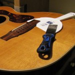 Bridge re-glue on a 1970's Guild 12-String acoustic guitar by South Austin Guitar Repair