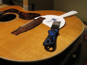 Bridge re-glue on a 1970's Guild 12-String acoustic guitar by South Austin Guitar Repair