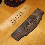 Bridge re-glue on a 1970's Guild 12-String acoustic guitar by South Austin Guitar Repair