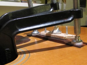 Bridge re-glue on a 1970's Guild 12-String acoustic guitar by South Austin Guitar Repair