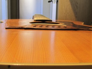 Bridge re-glue on a 1970's Guild 12-String acoustic guitar by South Austin Guitar Repair