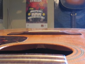 Bridge re-glue on a 1970's Guild 12-String acoustic guitar by South Austin Guitar Repair